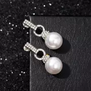 Серьги с жемчугом «Шарики и сцепление колец», цвет белый в серебре