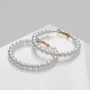 Серьги-кольца «Нежность жемчуга» кольца средние, цвет белый в золоте, d=5,5 см