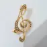 Брошь «Скрипичный ключ» сияние, цвет белый в золоте